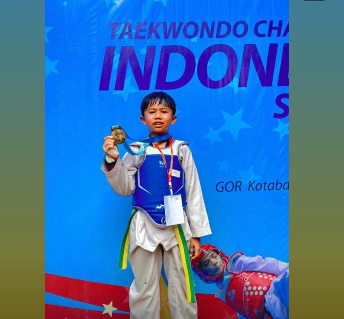 Muhammad Fachri Raih Emas di Kejuaraan Taekwondo Jambi Muhammad Fachri Raih Emas di Kejuaraan Taekwondo Jambi