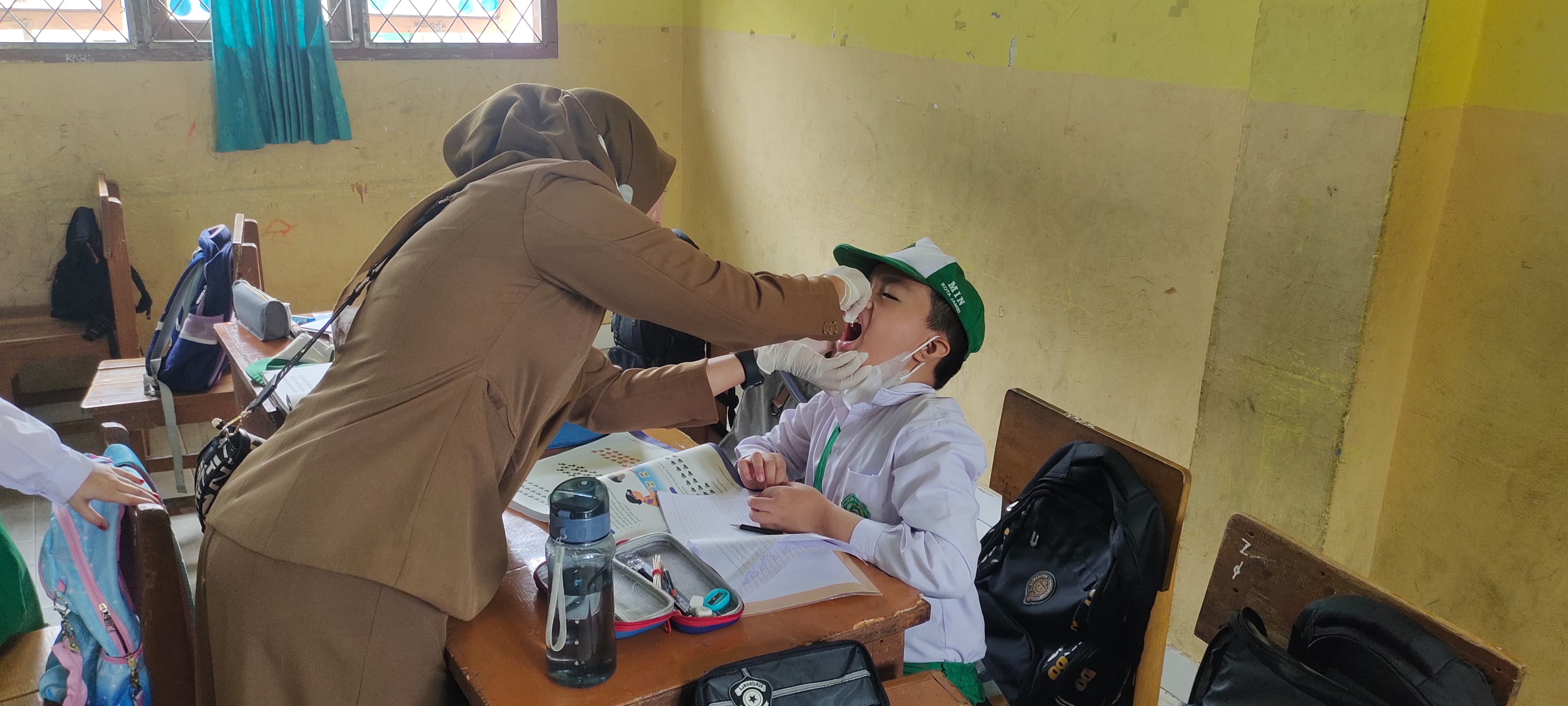 MELAKSANAKAN PIN POLIO